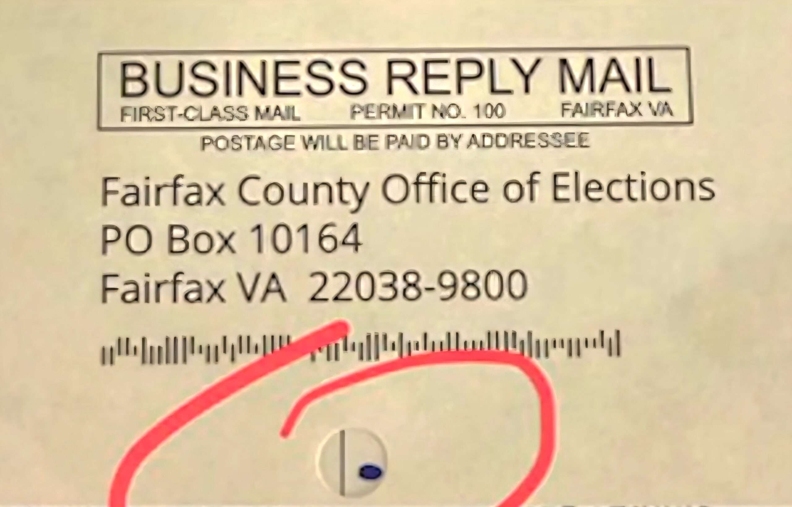 Fairfax County Virginia ballot return envelope with suspicious hole revealing voter choices