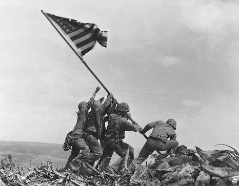 U.S. Marines raise the flag on Mount Suribachi, Iwo Jima, February 23, 1945